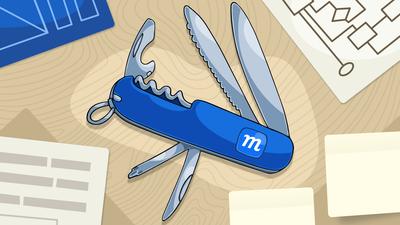 Illustration of a blue Swiss Army-style multi-tool with the Moqups "m" logo, surrounded by wireframes, flowcharts, and sticky notes on a wooden surface.